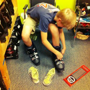 Trying on ski boots