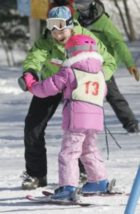 Instructor and student at ski lesson at Mad River Glen
