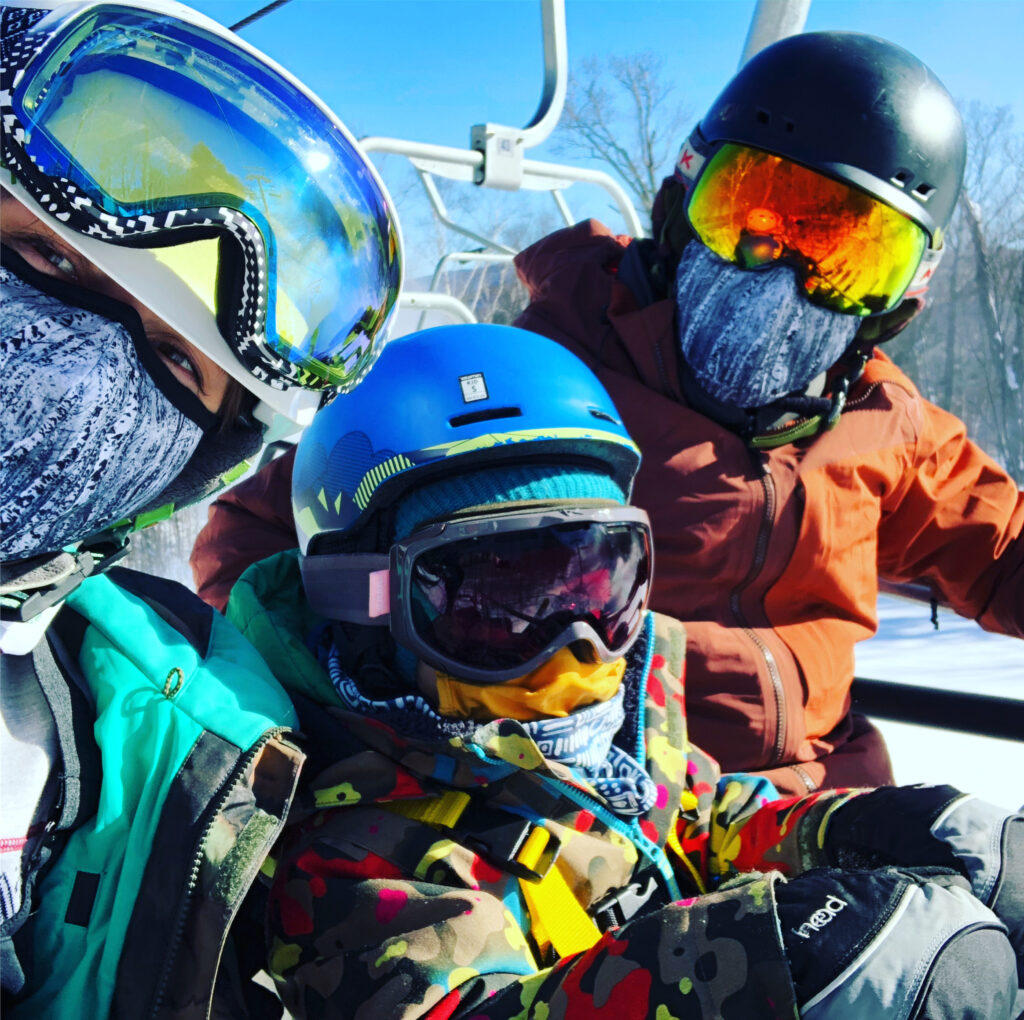 family on ski lift