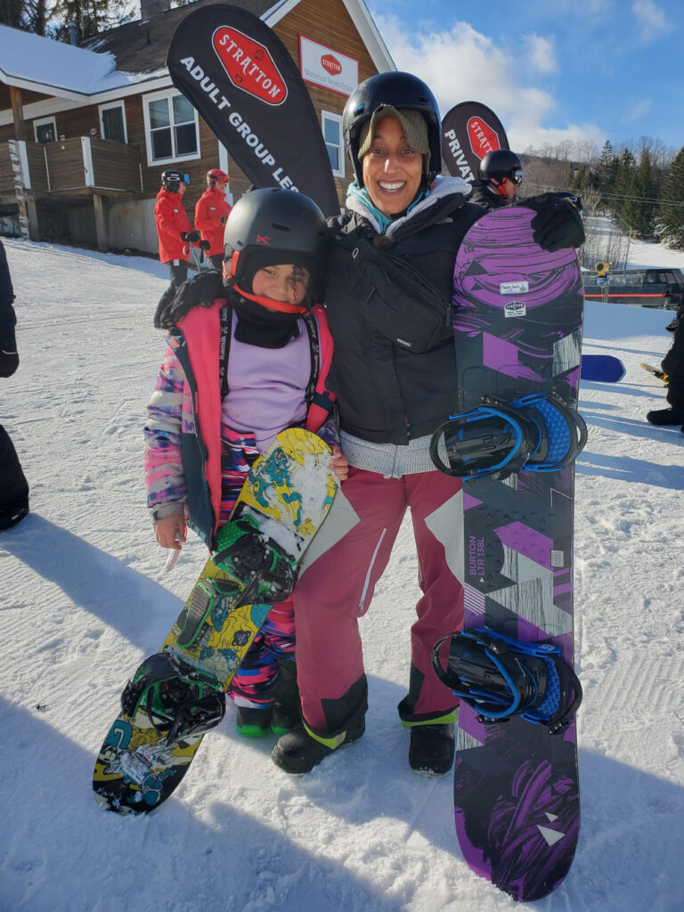 Mom and daughter snowboard lesson at Stratton