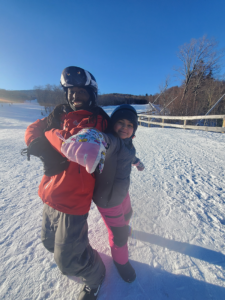 snowboarder and her instructor