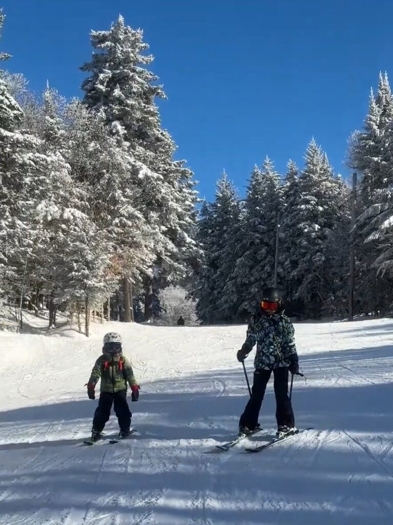 Mom and son skiing at Bolton Valley