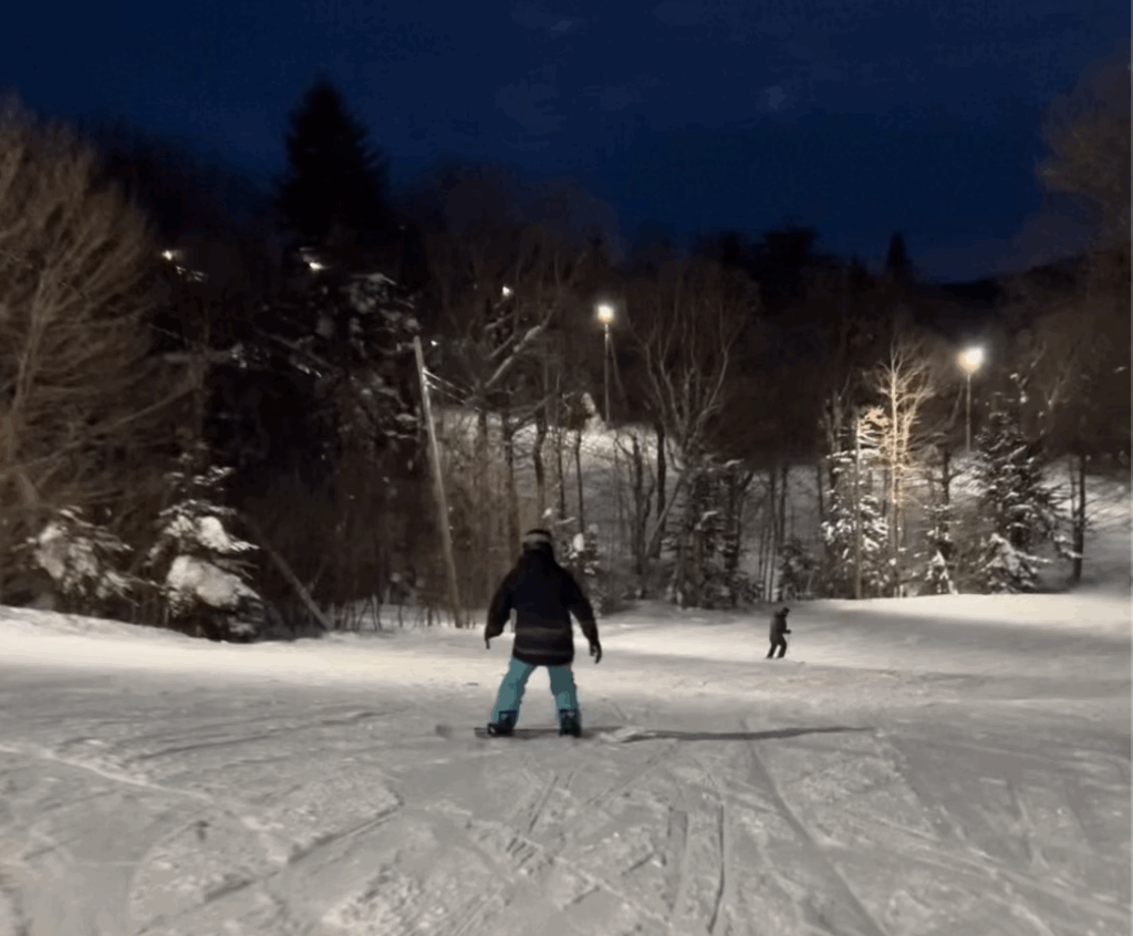 Snowboarding at night at Bolton Valley, Vermont