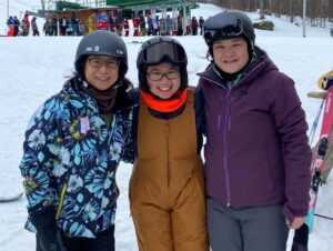 Three women meet at an Unlikely Riders ski meeting at Bolton Valley, Vermont