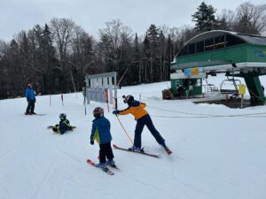 Family skiing at Burk Mountain, Vermont