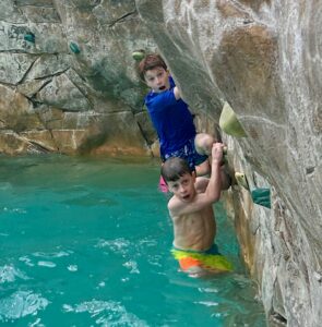 Rock climbing in the pool at Jay Peak's waterpark, Vermont